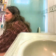 A hidden camera in a home bathroom records an unsuspecting, plump girl taking a shit while sitting on a toilet. Audible pooping sounds. Presented in 720P vertical HD format. About 2.5 minutes.